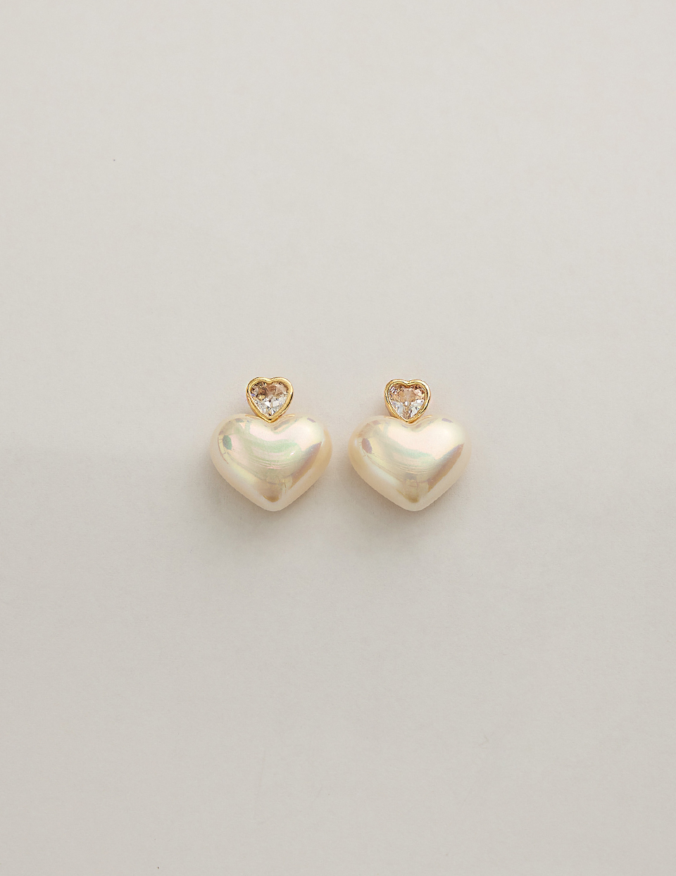 雙心鋯石。針式耳環