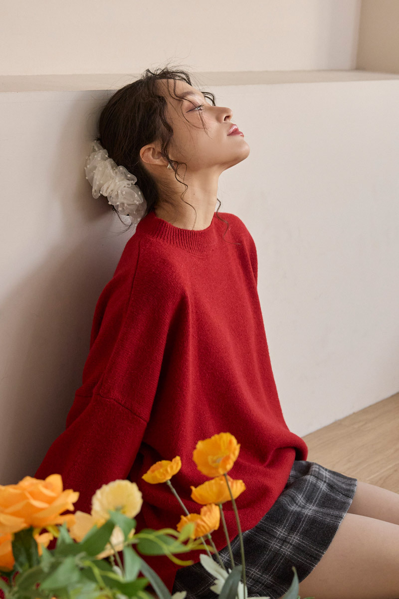 落肩下擺開衩毛衣