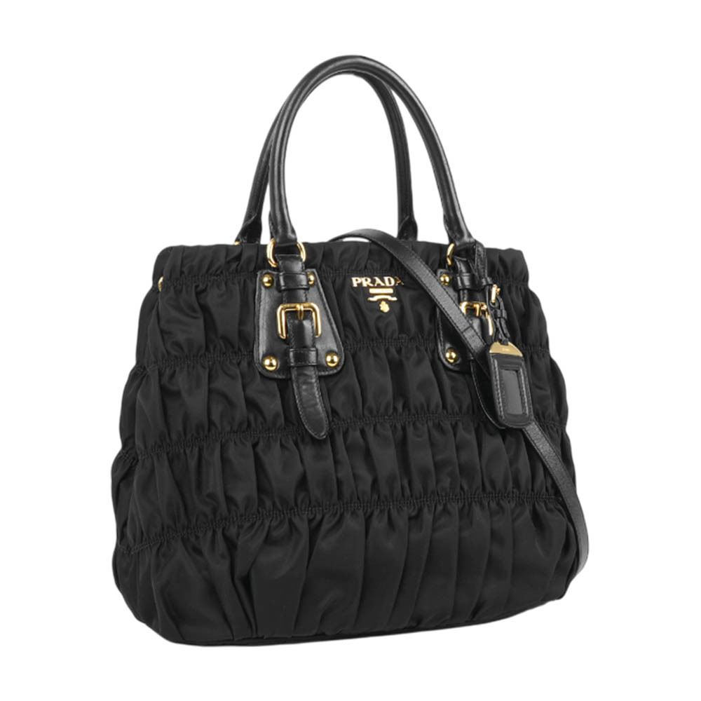 【Prada】Gaufre 浮雕標誌尼龍及皮革二用包/高菲包(黑色)