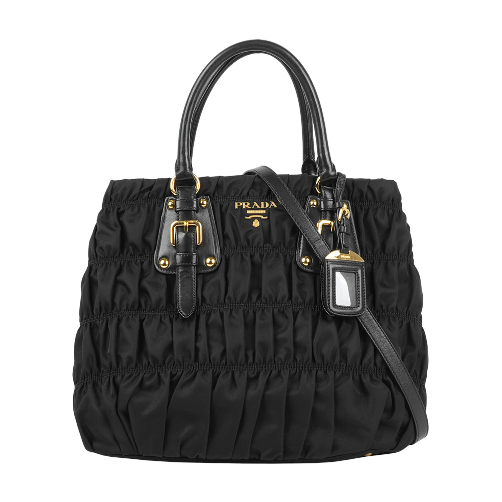 【Prada】Gaufre 浮雕標誌尼龍及皮革二用包/高菲包(黑色)