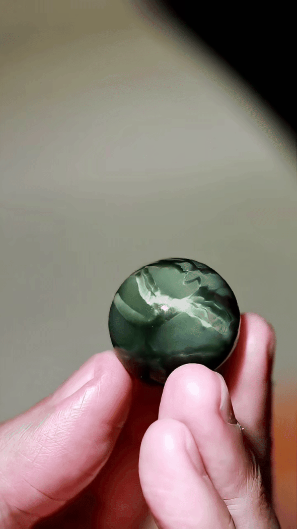 1226712 和田玉貓眼大珠子