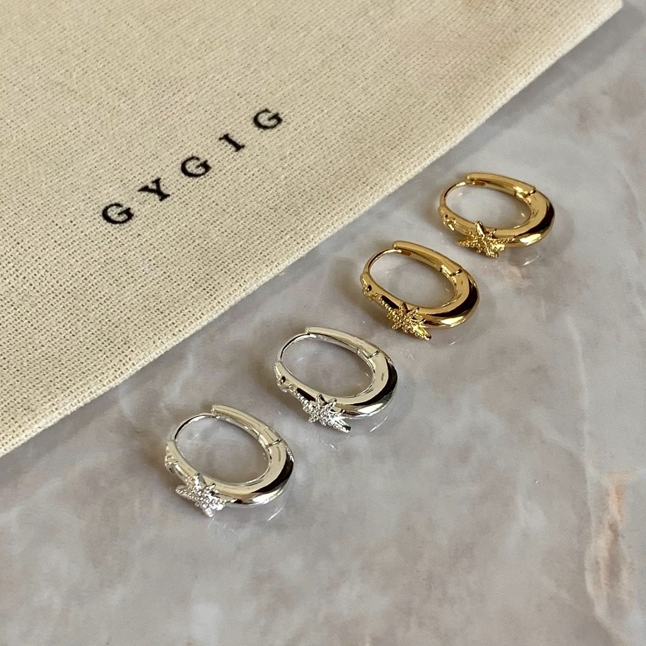 Gy”Chic八芒星金屬感橢圓耳釦釘