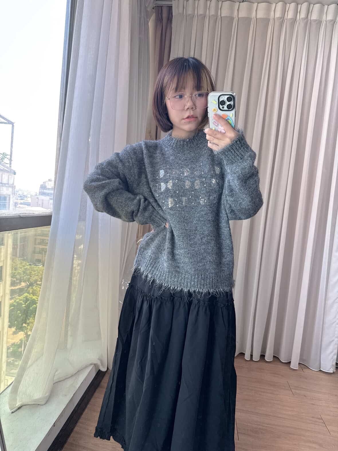 Distressed and stylish shiny letter sweater