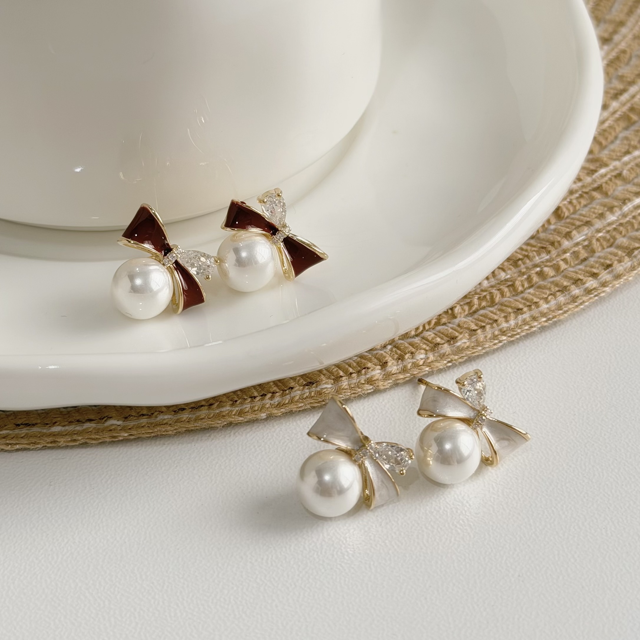 A152烤漆鋯石蝴蝶結珍珠耳針