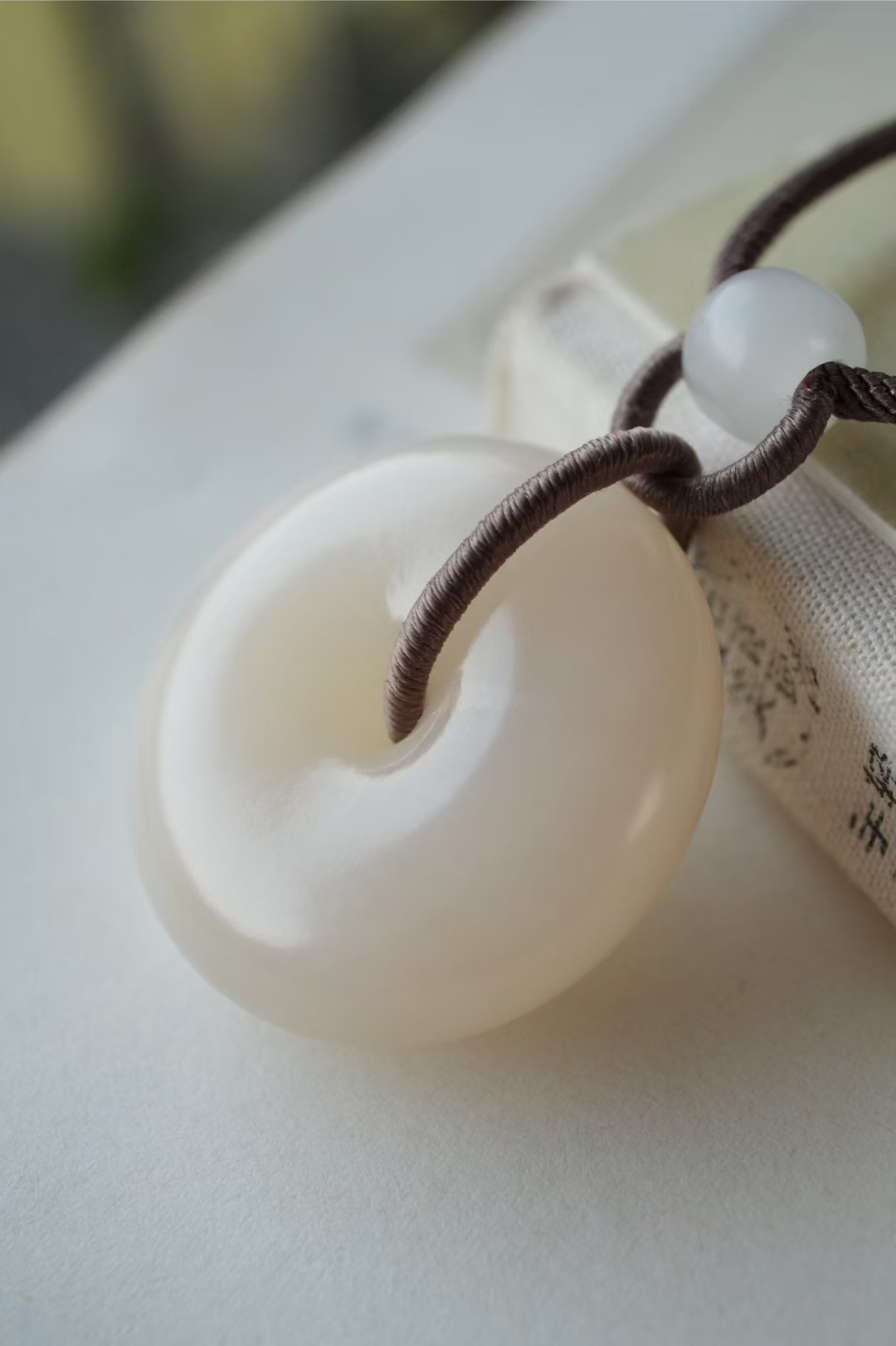 1229437 和田玉濃郁藕粉平安扣掛件 (30mm直徑)