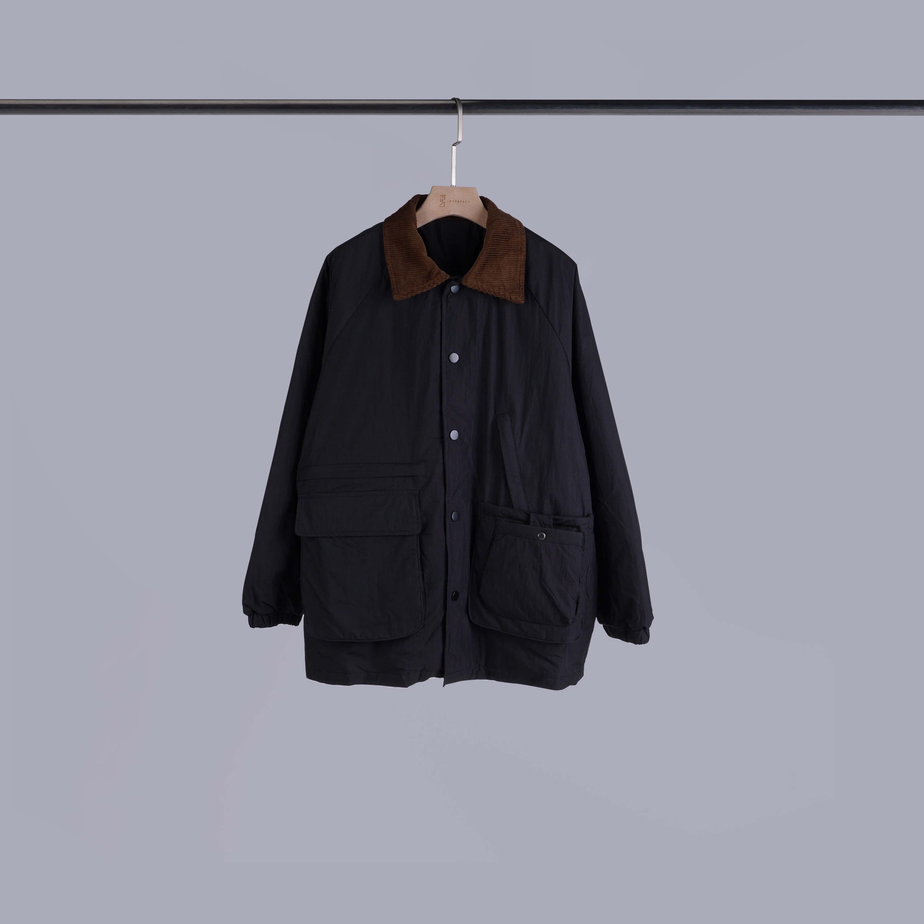 設計感拼接翻領鋪棉外套 | 就是黒