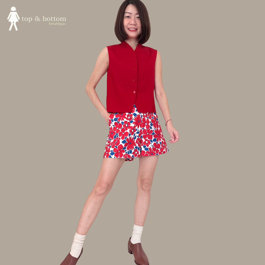 SLEEVELESS BUTTON DOWN BLOUSE