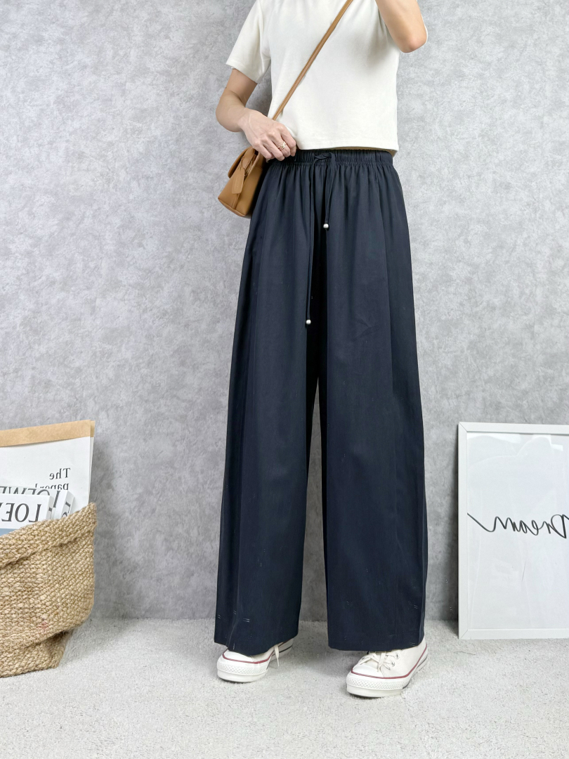 不太正式、卻很有質感的彎刀寬褲