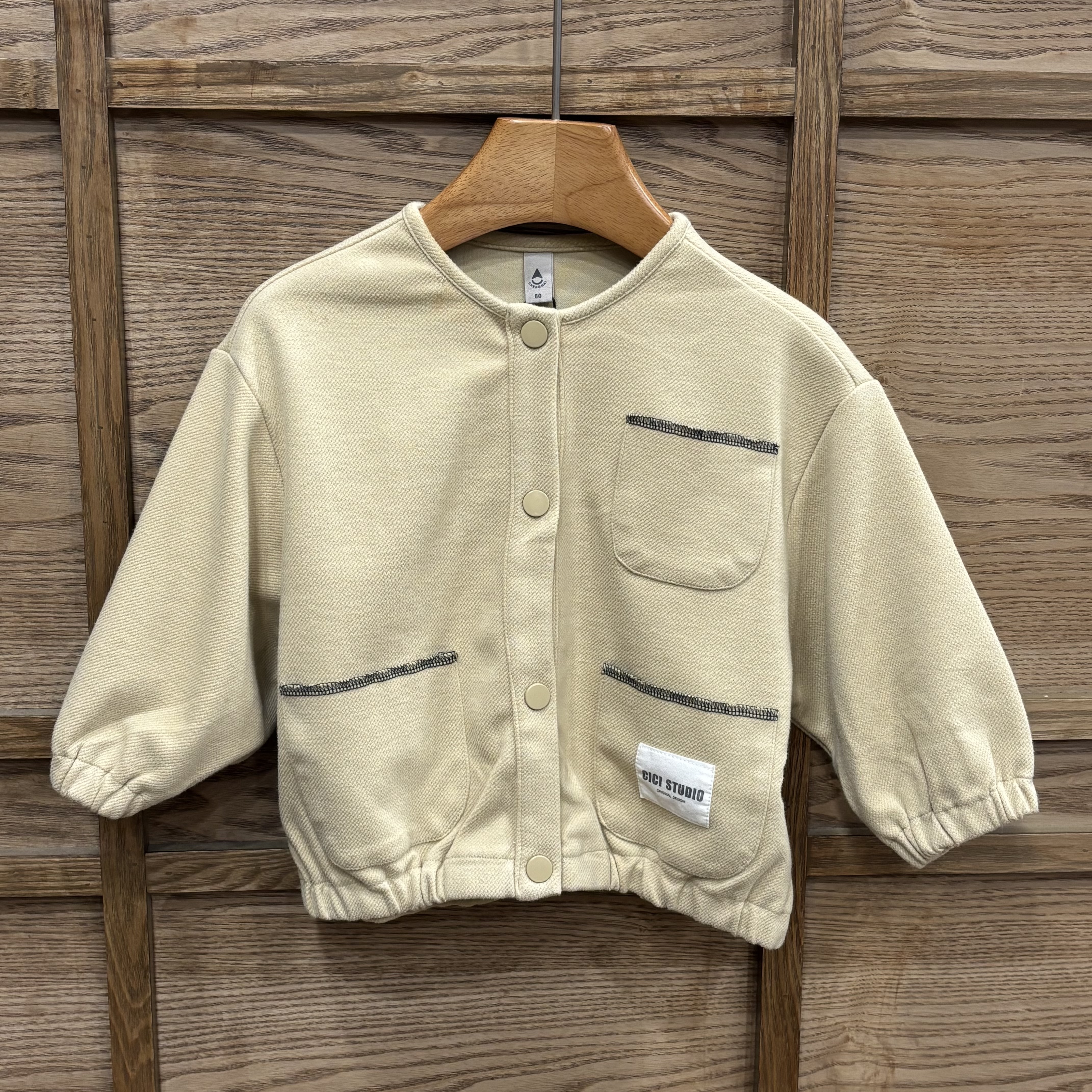 A03927口袋縫線針織外套