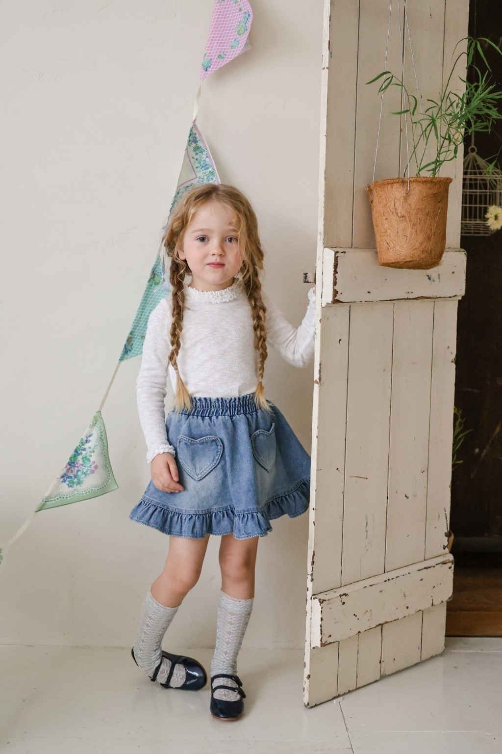 正韓春FLO 兩色愛心口袋牛仔裙