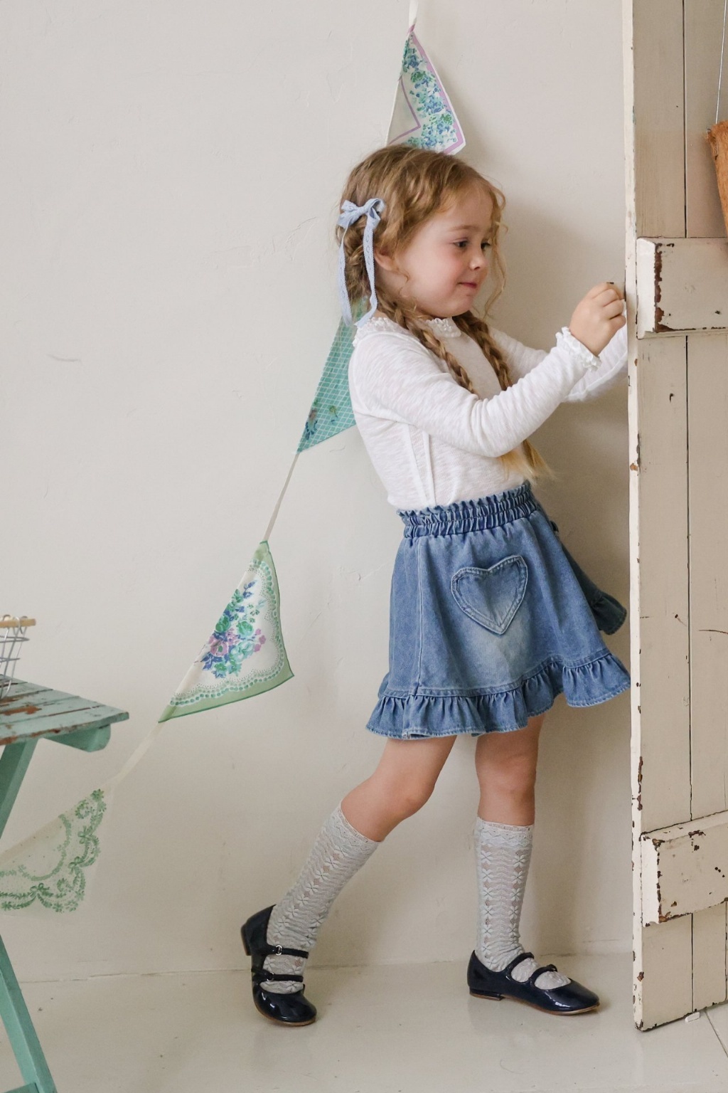 正韓春FLO 兩色愛心口袋牛仔裙