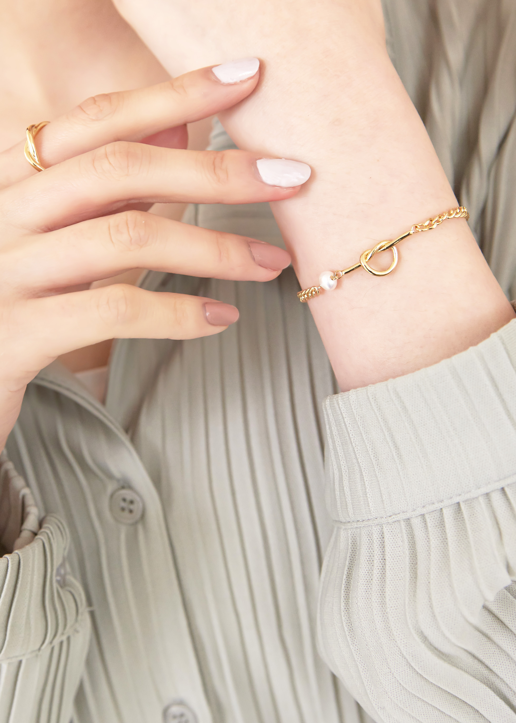 愛心扭結珍珠手環