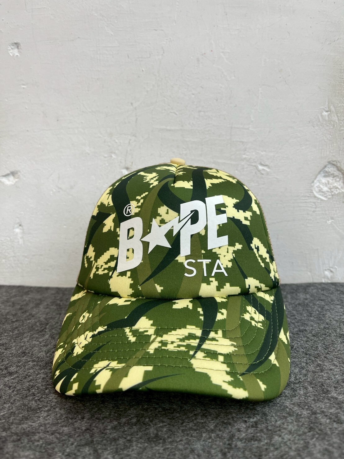 BAPE x CLOT EGRA CAMO TRUCKER CAP GREEN