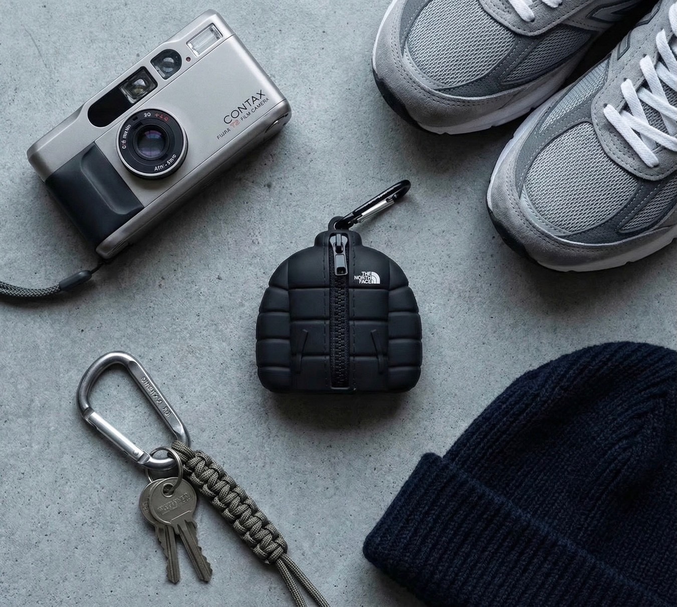 The North Face 經典Nuptse外套「縮小版」小物/耳機保護殼