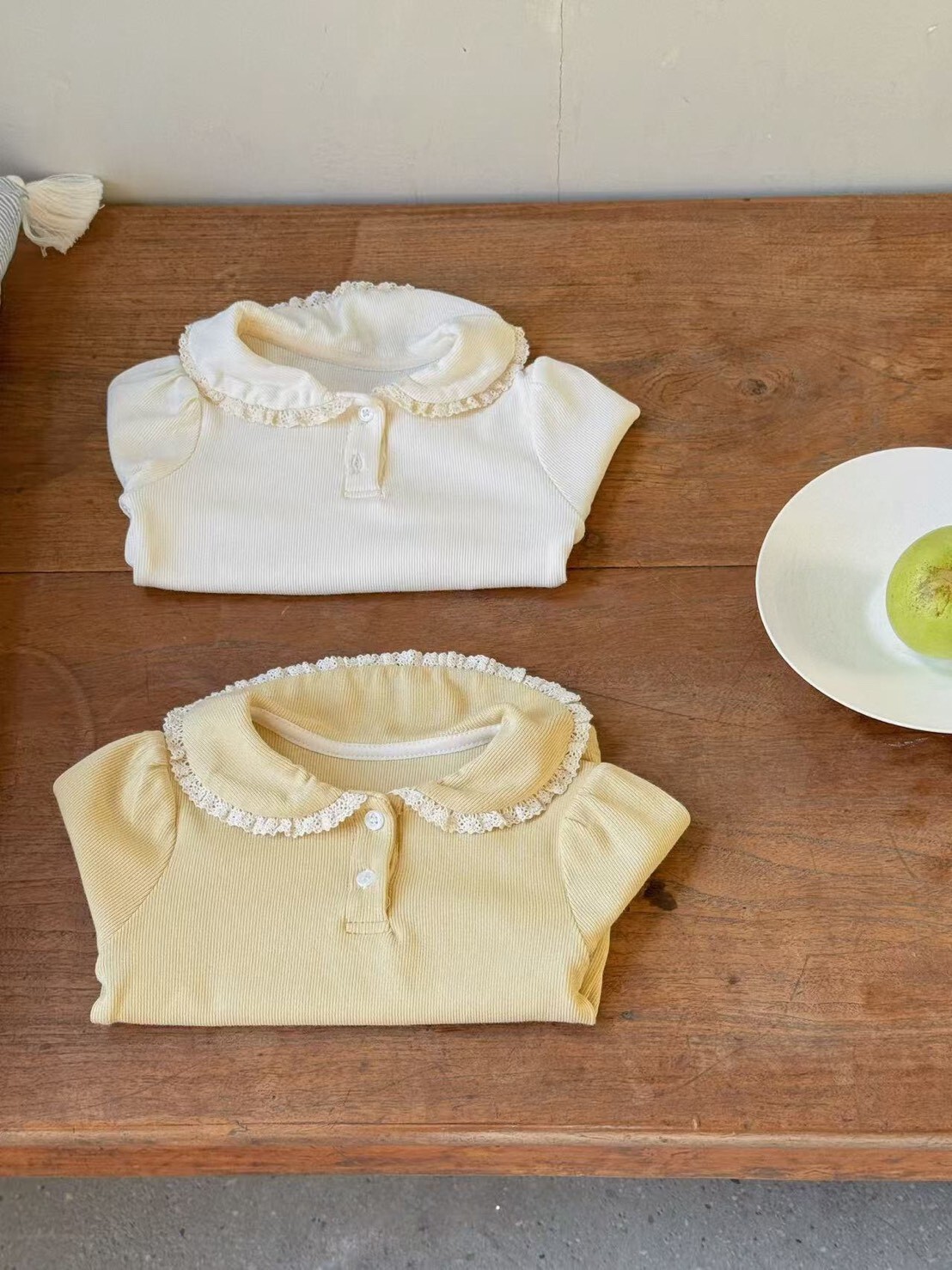 奶油糖排釦針織背心