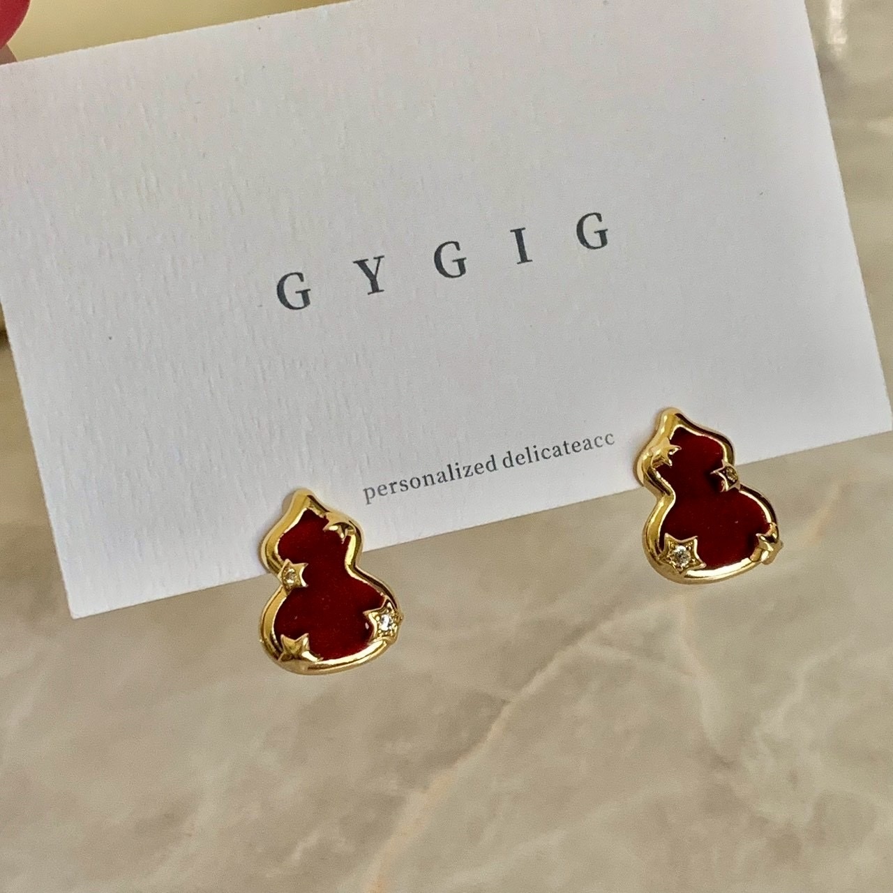 Gy’立體毛絨絨紅金葫蘆”金星邊耳釘