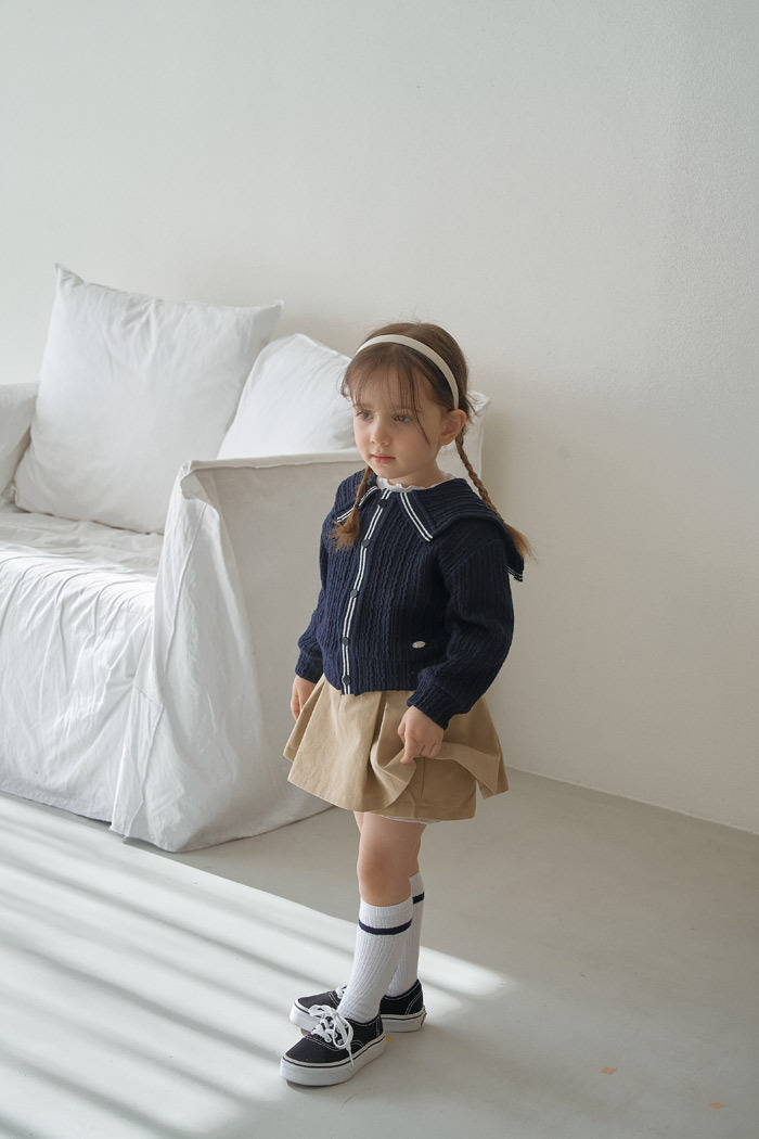 正韓春momoann 卡其百褶愛心小標裙褲