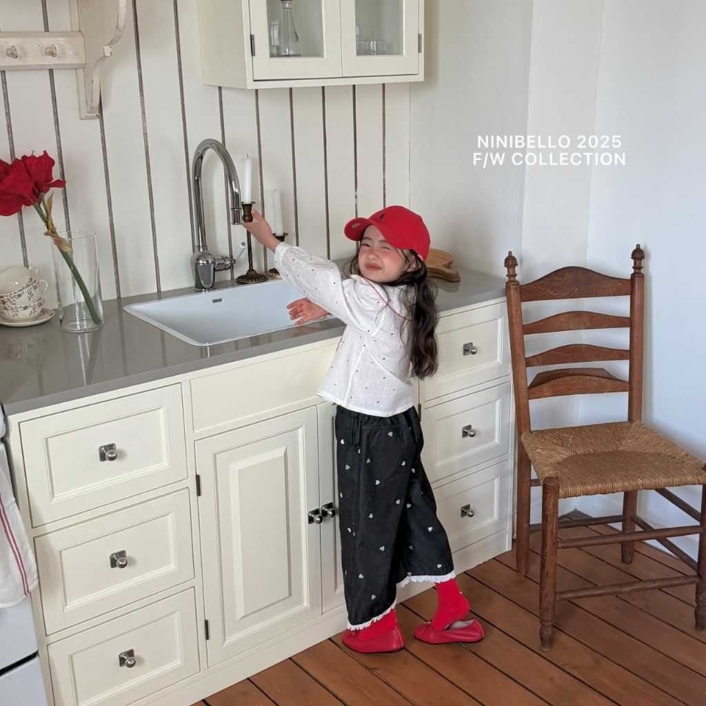 正韓春Ninibello 灑滿愛心奶油邊寬褲