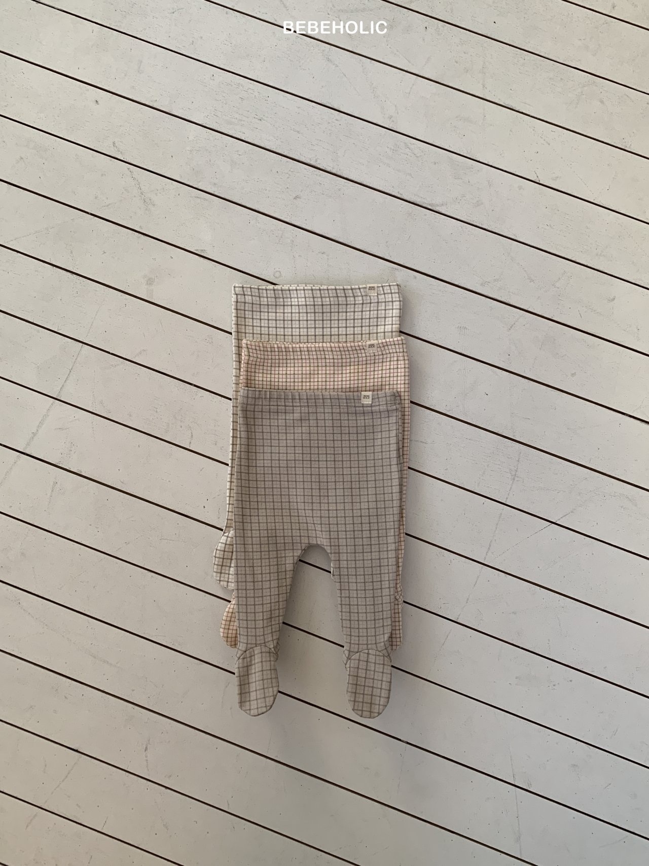 Bebe Holic Check Footed Leggings