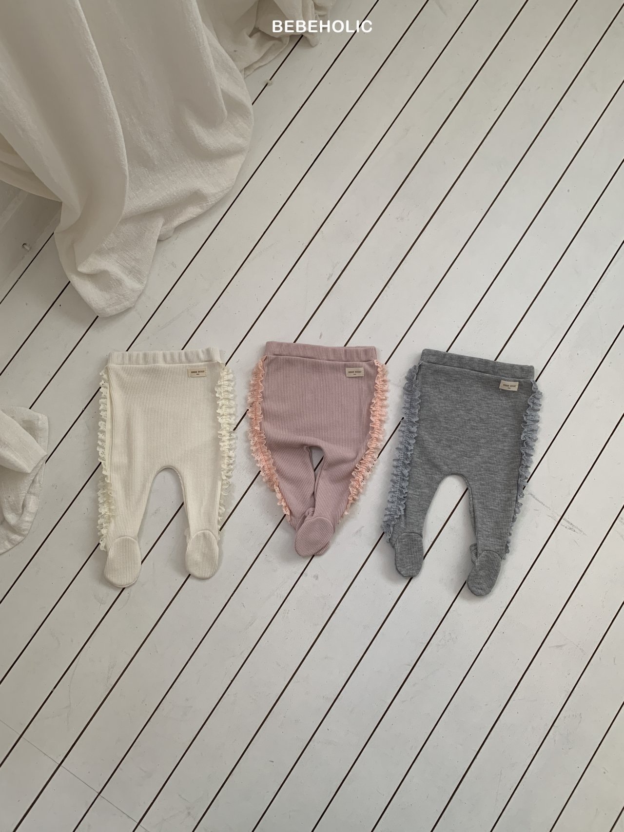 Bebe Holic Shasha Footed Leggings