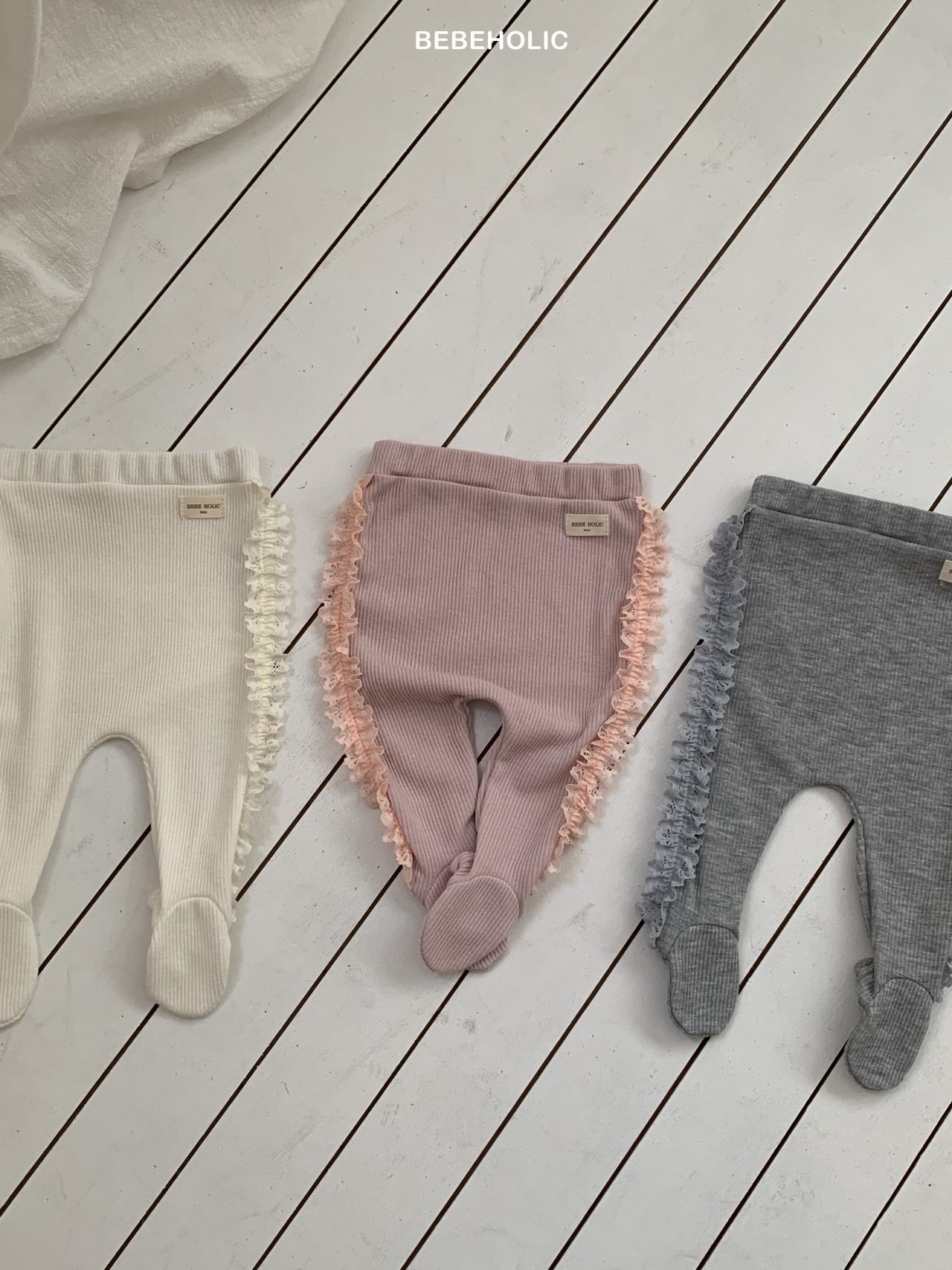 Bebe Holic Shasha Footed Leggings