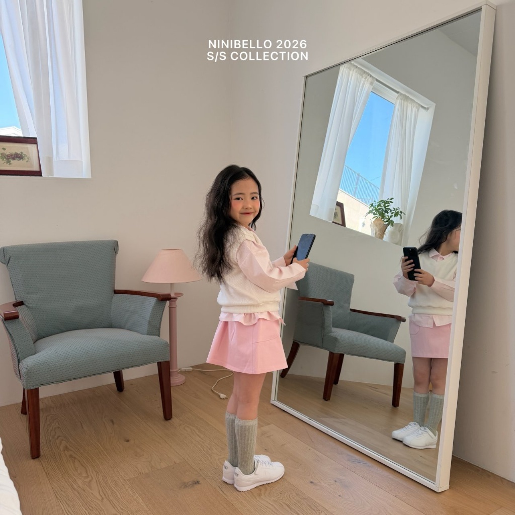 正韓春Ninibello 兩色簡單大方淘氣短裙