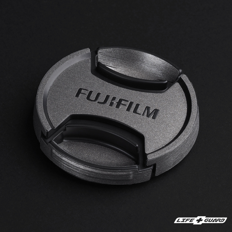 FUJIFILM XC 13-33mm F3.5-6.3 OIS 鏡頭蓋貼膜特寫，LIFE+GUARD，BRTI設計風格