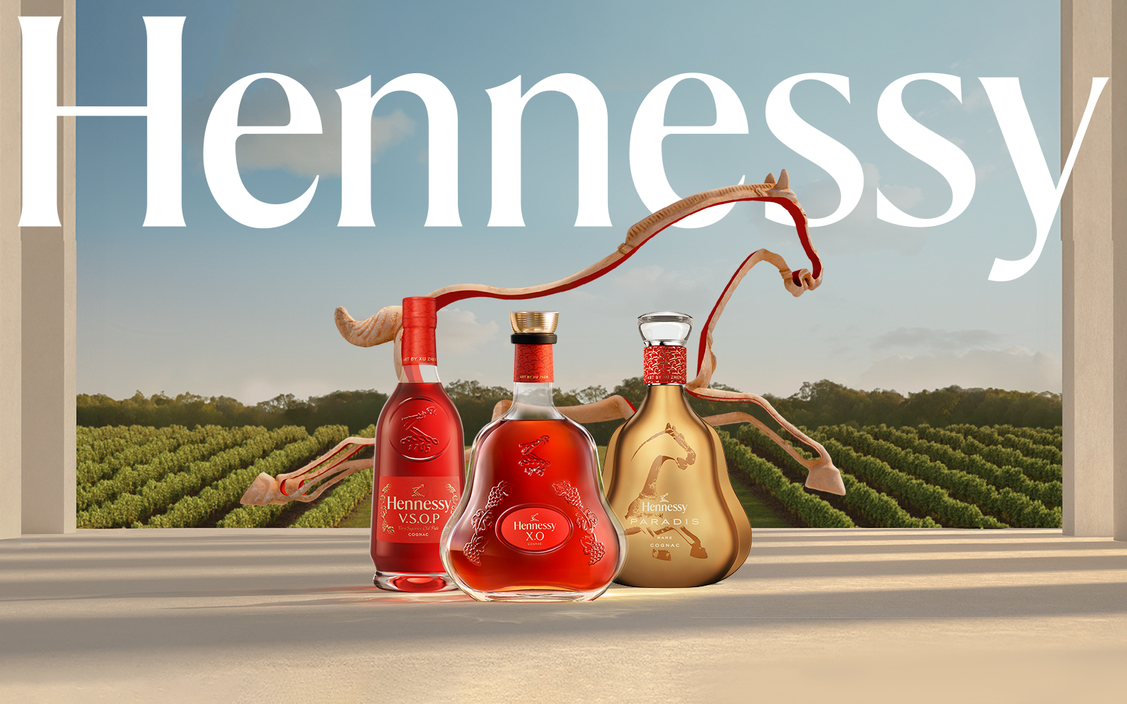 The iconic Hennessy X.O carafe features a vibrant red and gold as well as a red neck label adorned with a dark red horse