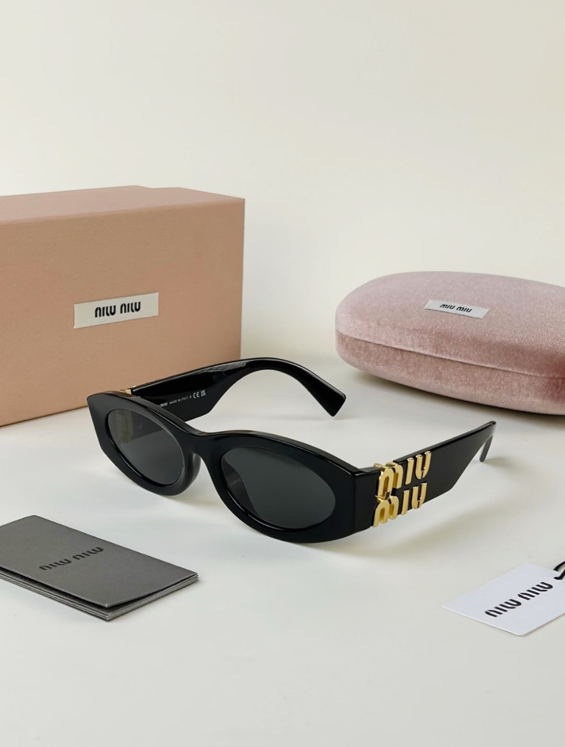 MIU MIU經典橢圓 黑金墨鏡 【可配度數】