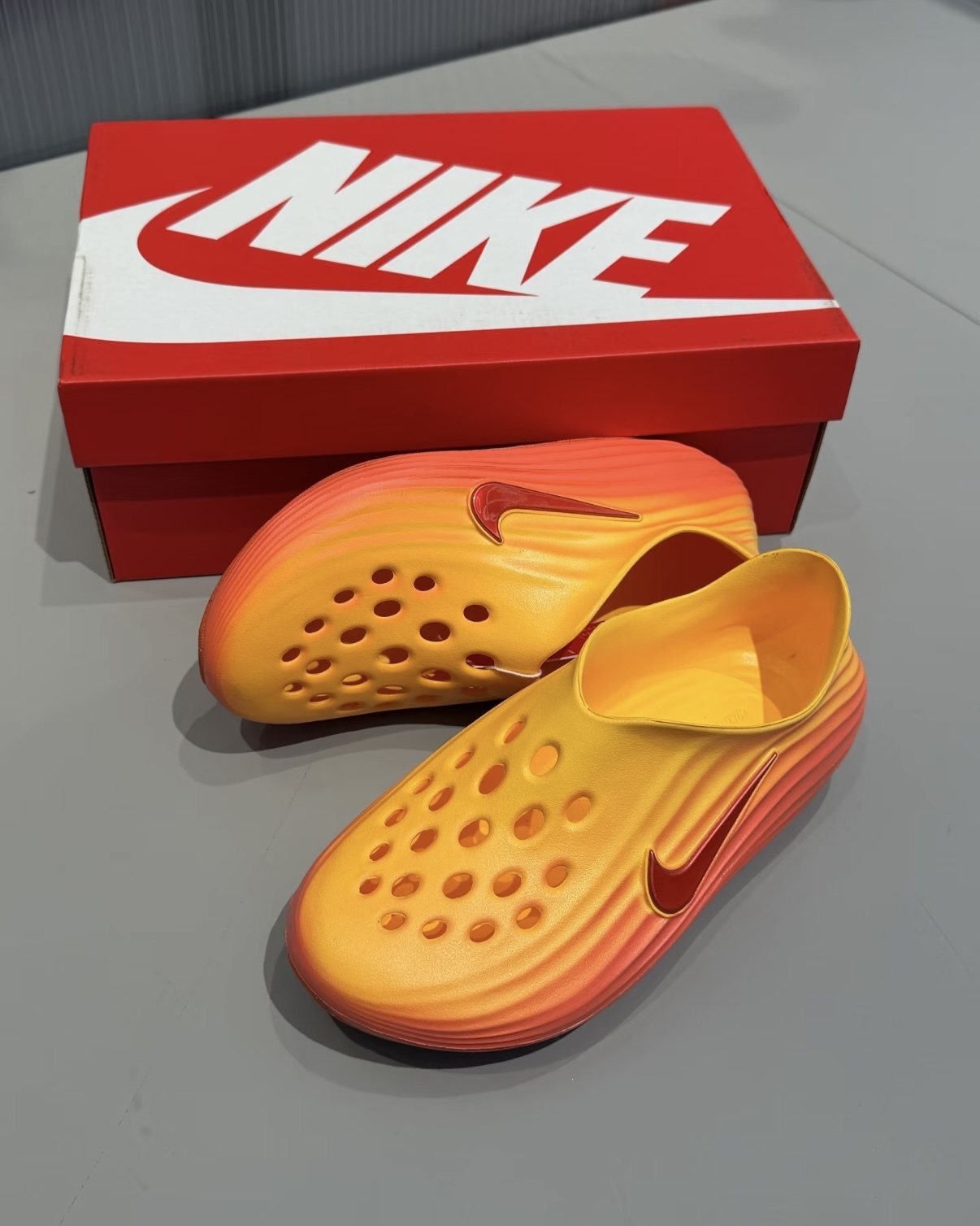 Nike ReactX Rejuven8 "Topaz Gold" 橘紅漸層 防水 泡棉 拖鞋 懶人鞋 洞洞鞋 涼鞋 恢復鞋