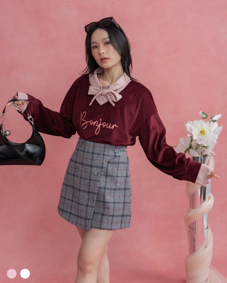 格紋毛呢不對稱設計排釦短裙