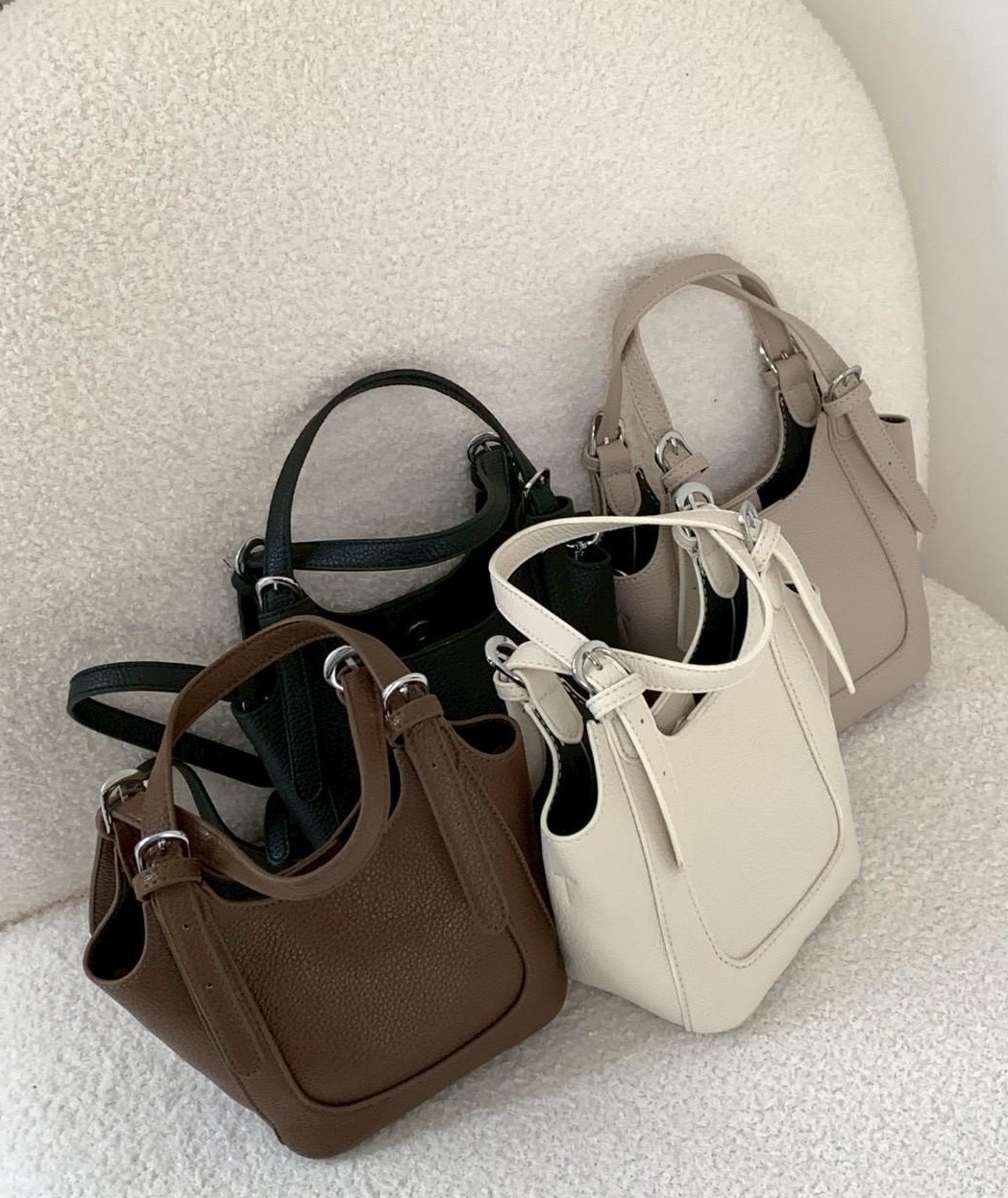 荔枝手提肩揹水桶子母包