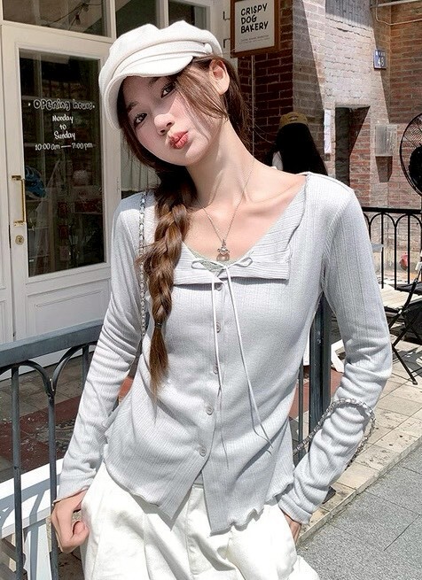 假兩件接蕾絲綁結排釦衣