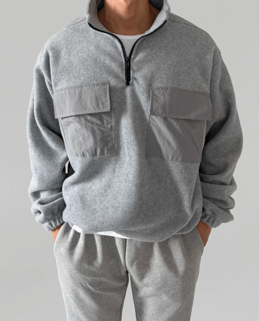 撞色口袋抓絨衫