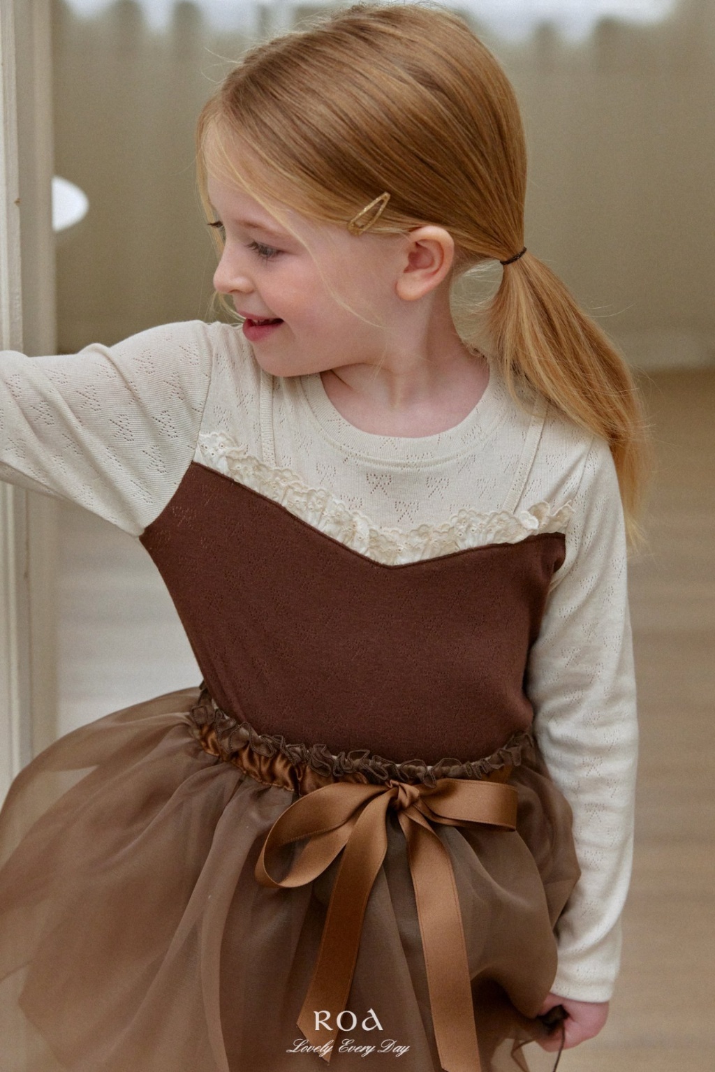 正韓春ROA 兩色假兩件蝴蝶結滿滿上衣