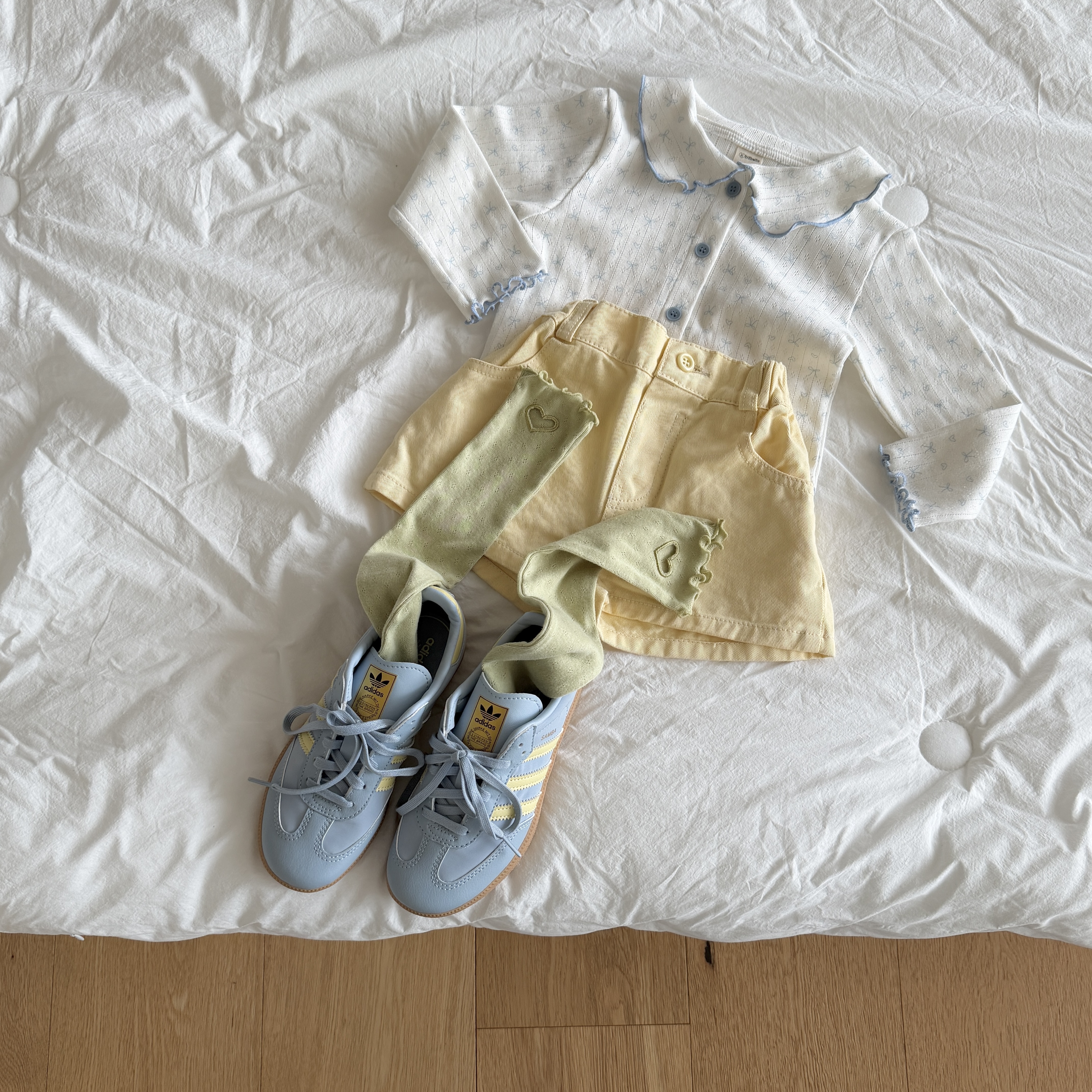 女孩蝴蝶結開襟衫