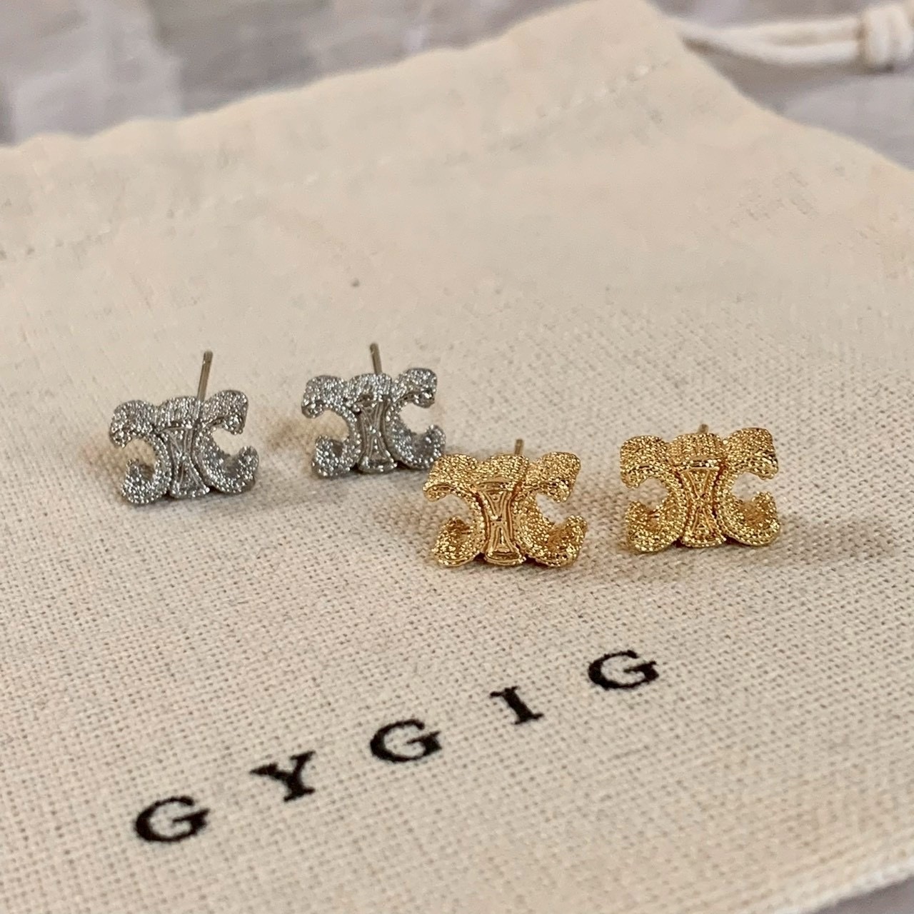 Gy”Lumière燙金浮雕立體凱旋門’重工耳釘