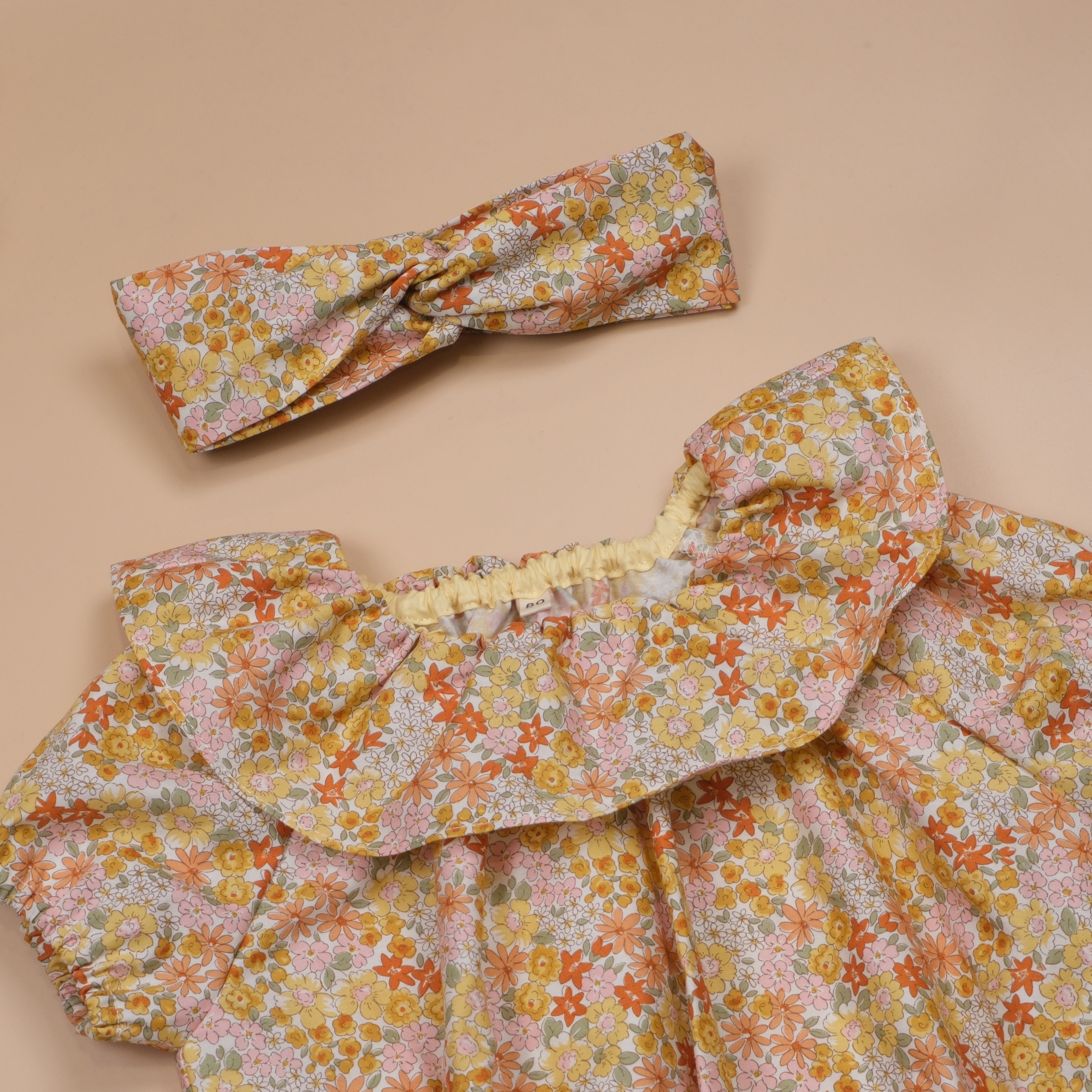 花邊咚咚系列 ❉ 橘黃色小花 ❉ 大領片連身包屁衣