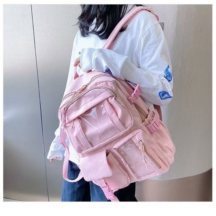 男女通用 书包双肩 开窗书包 可放公仔