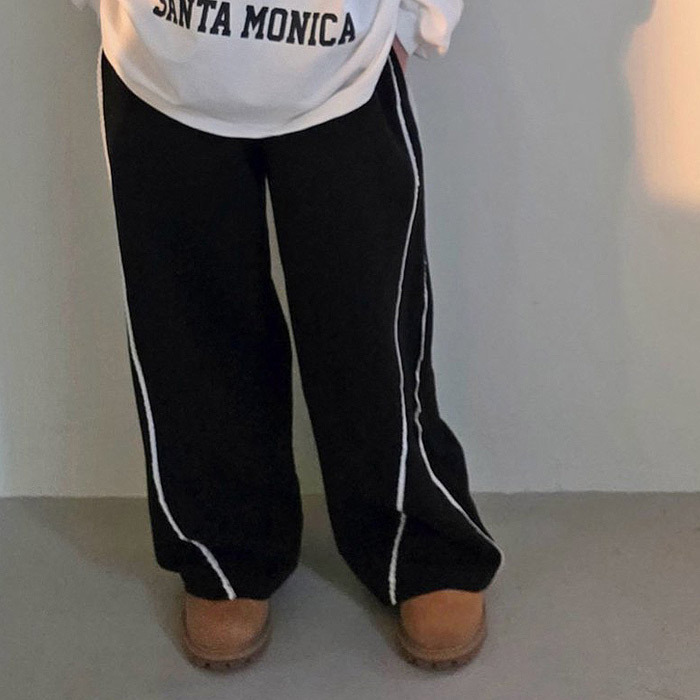 正韓春Ccomma 兩色側線條運動長褲