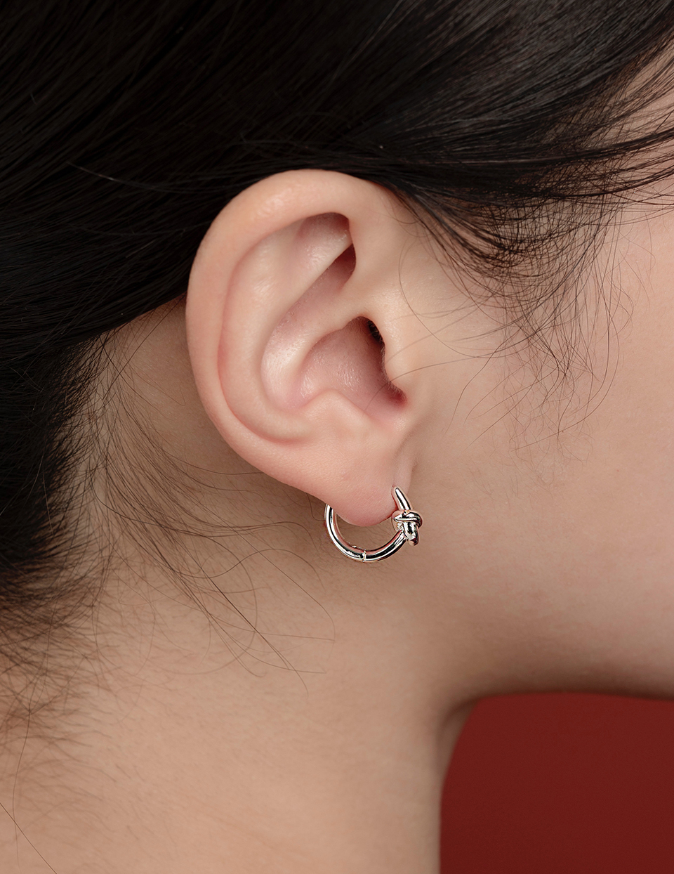 打結銀圈。針式耳環