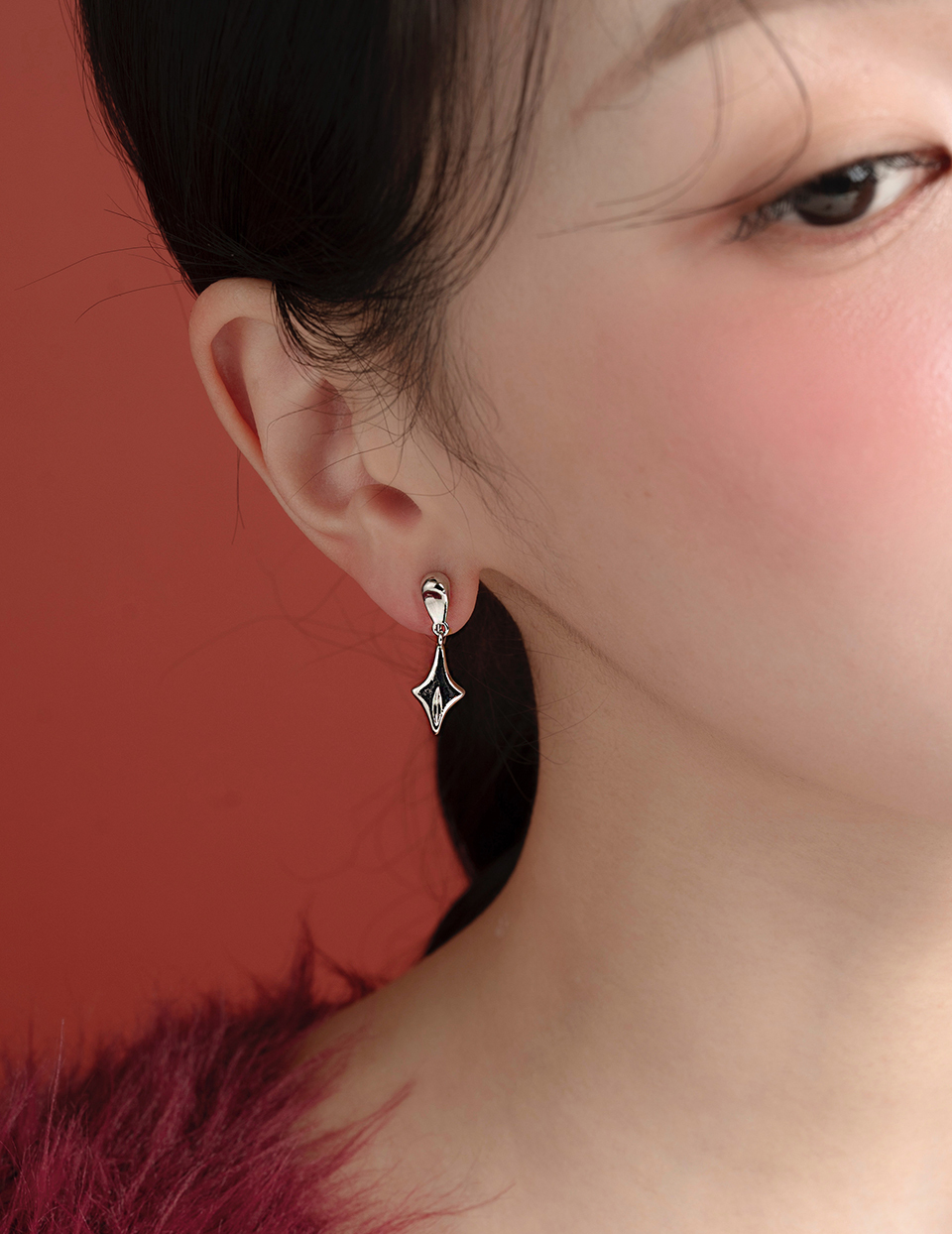 垂墜星芒。夾式耳環