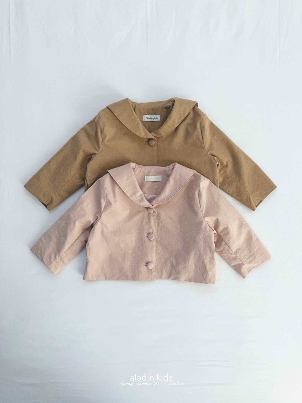 正韓春Aladin 兩色圓扣娃娃領外套