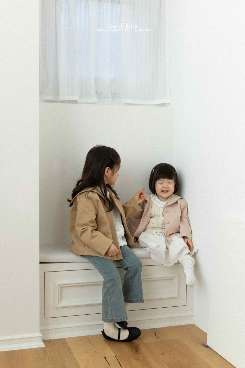 正韓春Aladin 兩色圓扣娃娃領外套