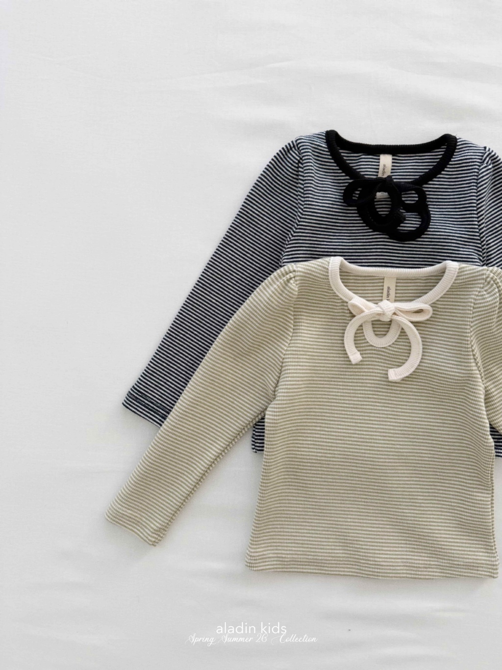 正韓春Aladin 兩色綁帶條紋上衣