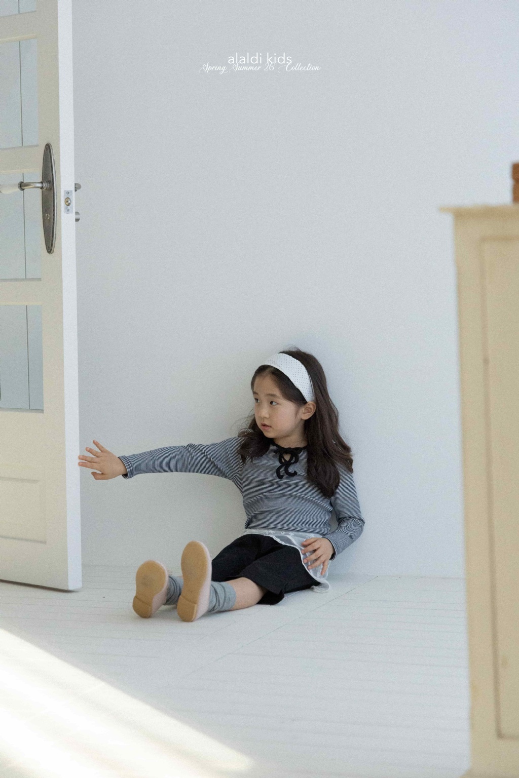 正韓春Aladin 兩色綁帶條紋上衣