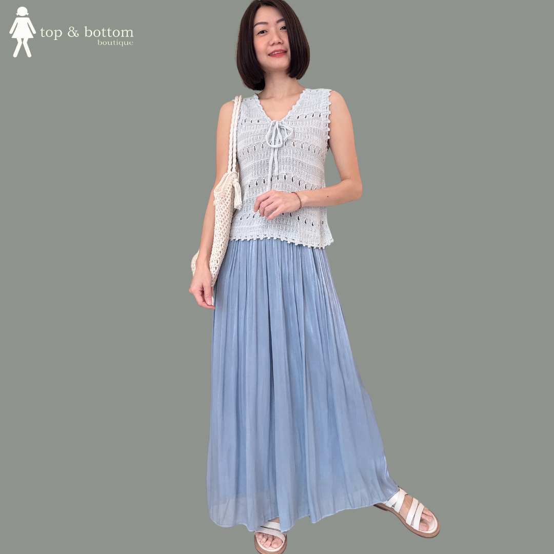 SLEEVELESS RIBBON FRONT KNIT BLOUSE