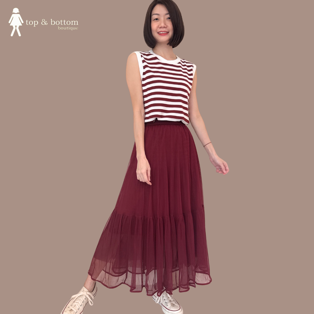 SLEEVELESS STRIPED KNIT BLOUSE