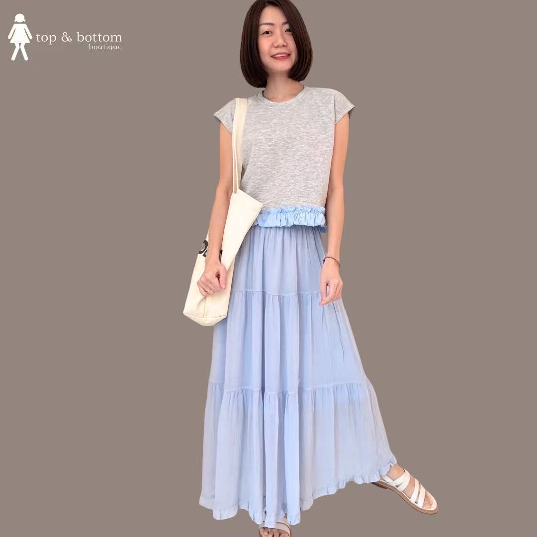 SLEEVELESS SPANDEX BLOUSE WITH RUFFLED HEM