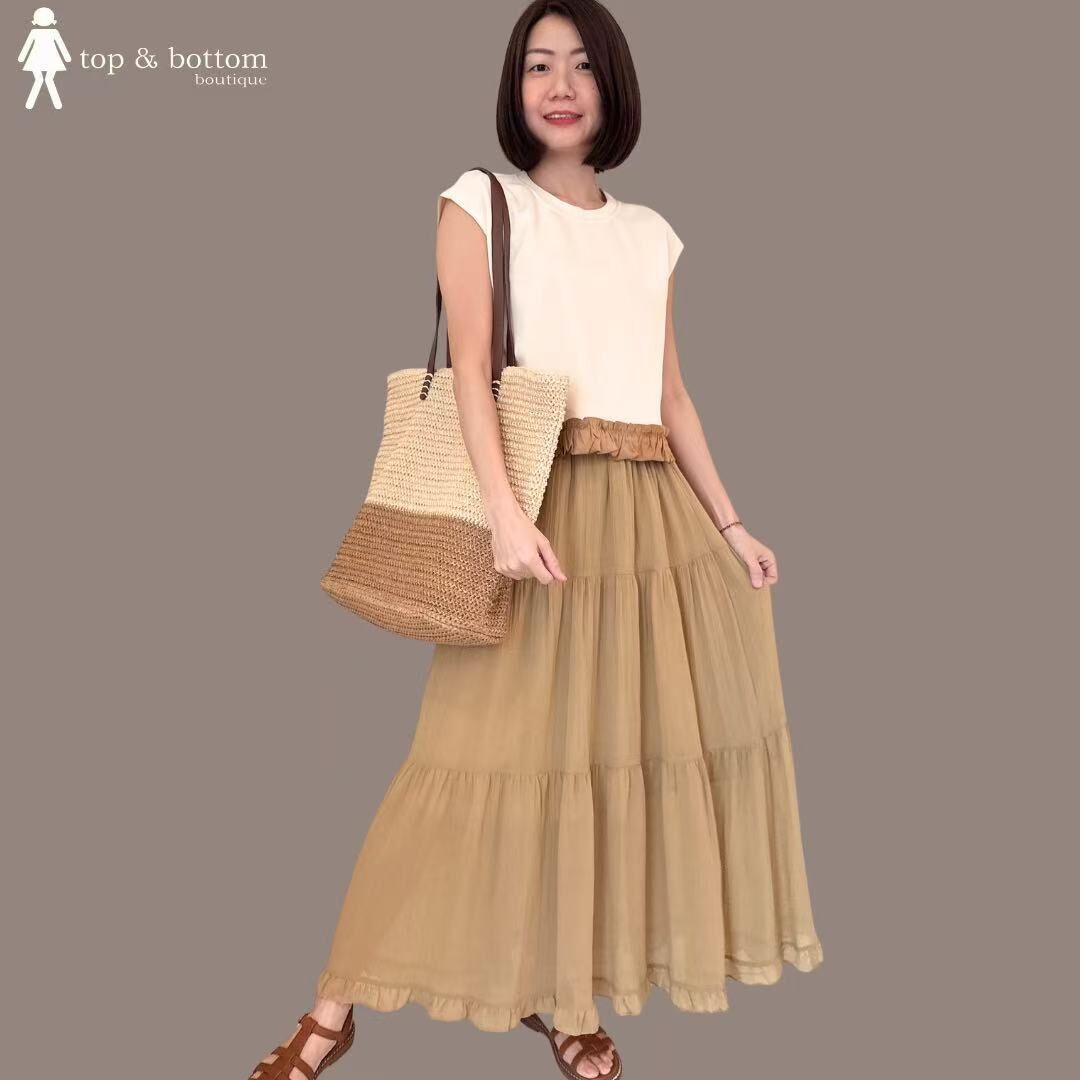 SLEEVELESS SPANDEX BLOUSE WITH RUFFLED HEM